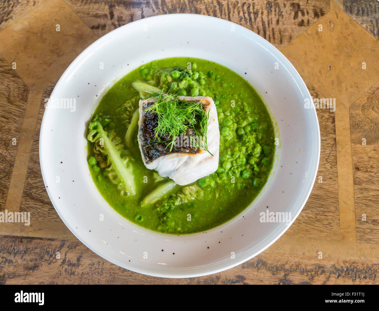 Café Hake with braised peas Gem lettuce hearts and Dill Chadwick & Co