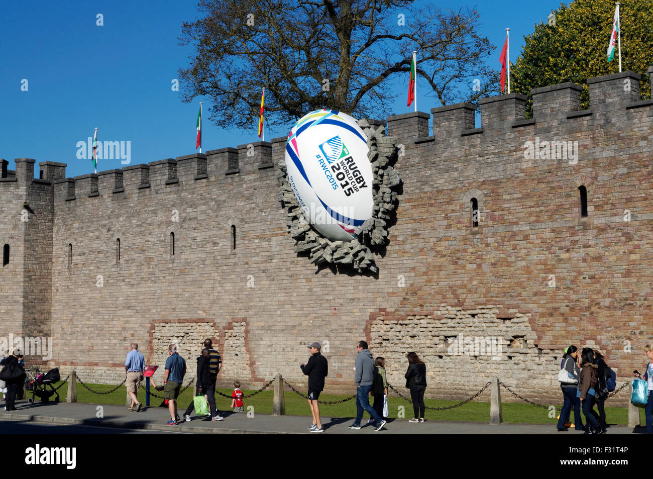 Giant rugby ball crashed into the wall of Cardiff Castle to mark the