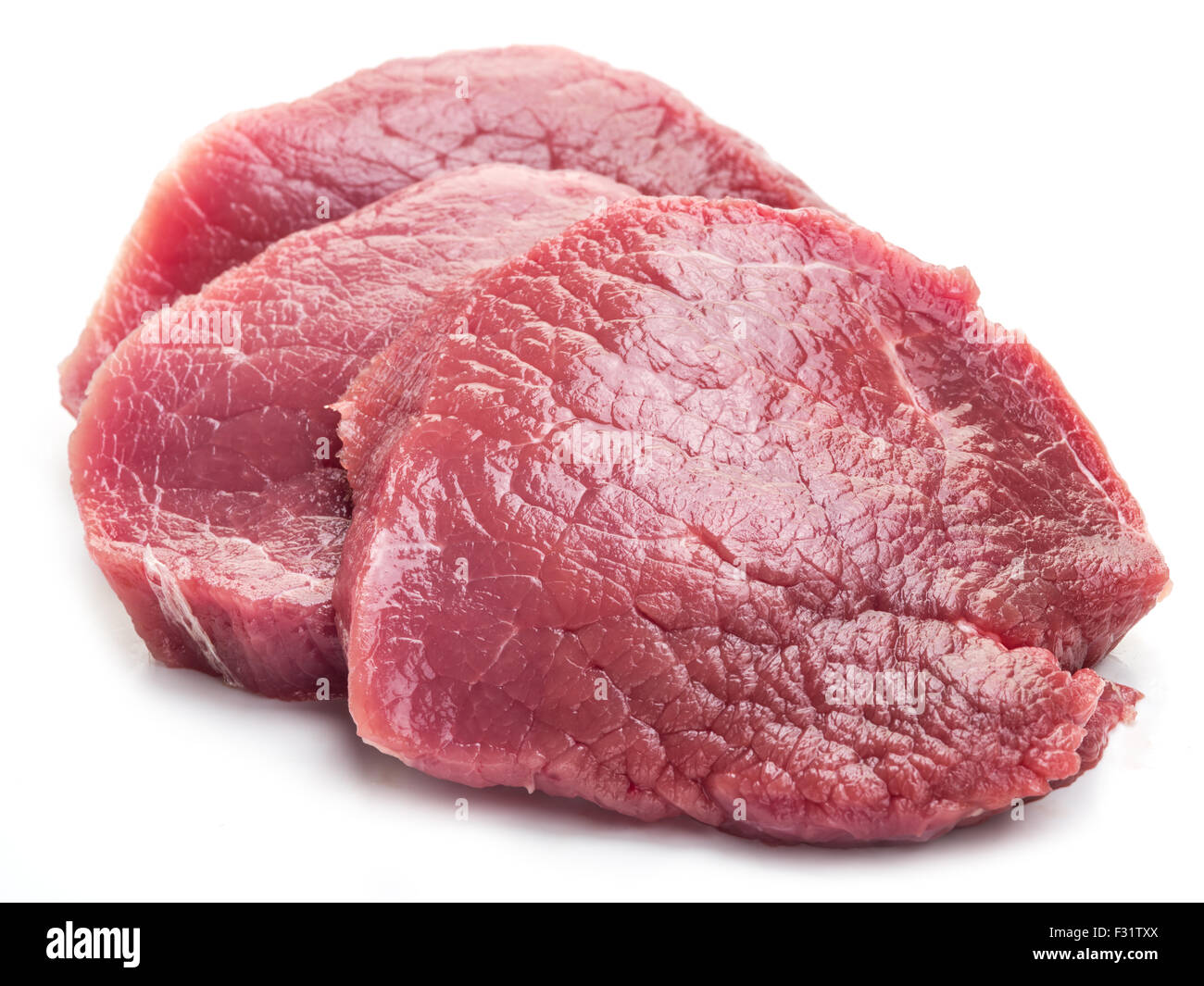 Raw beef steaks on a white background. Stock Photo