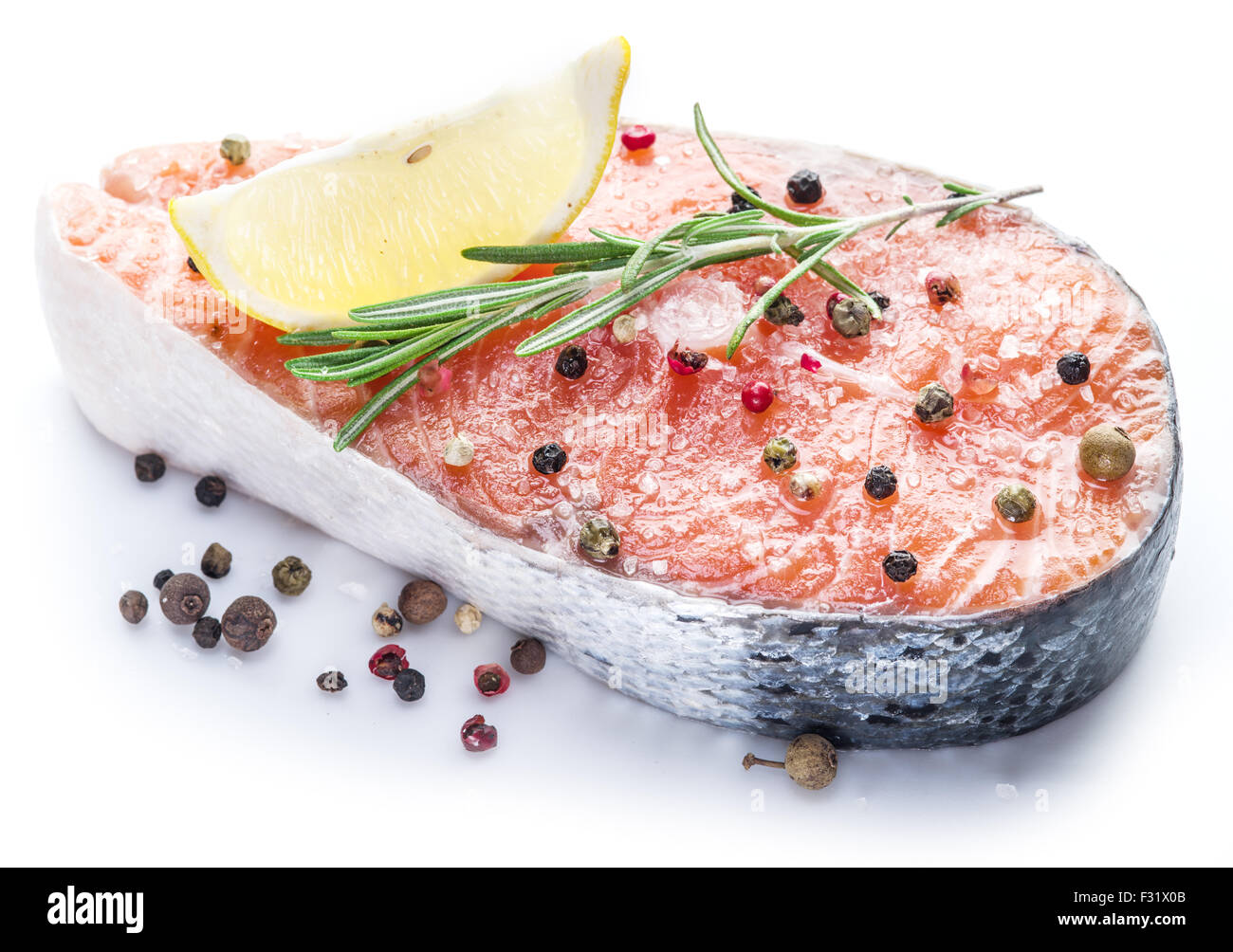 Salmon steak on white background Stock Photo - Alamy