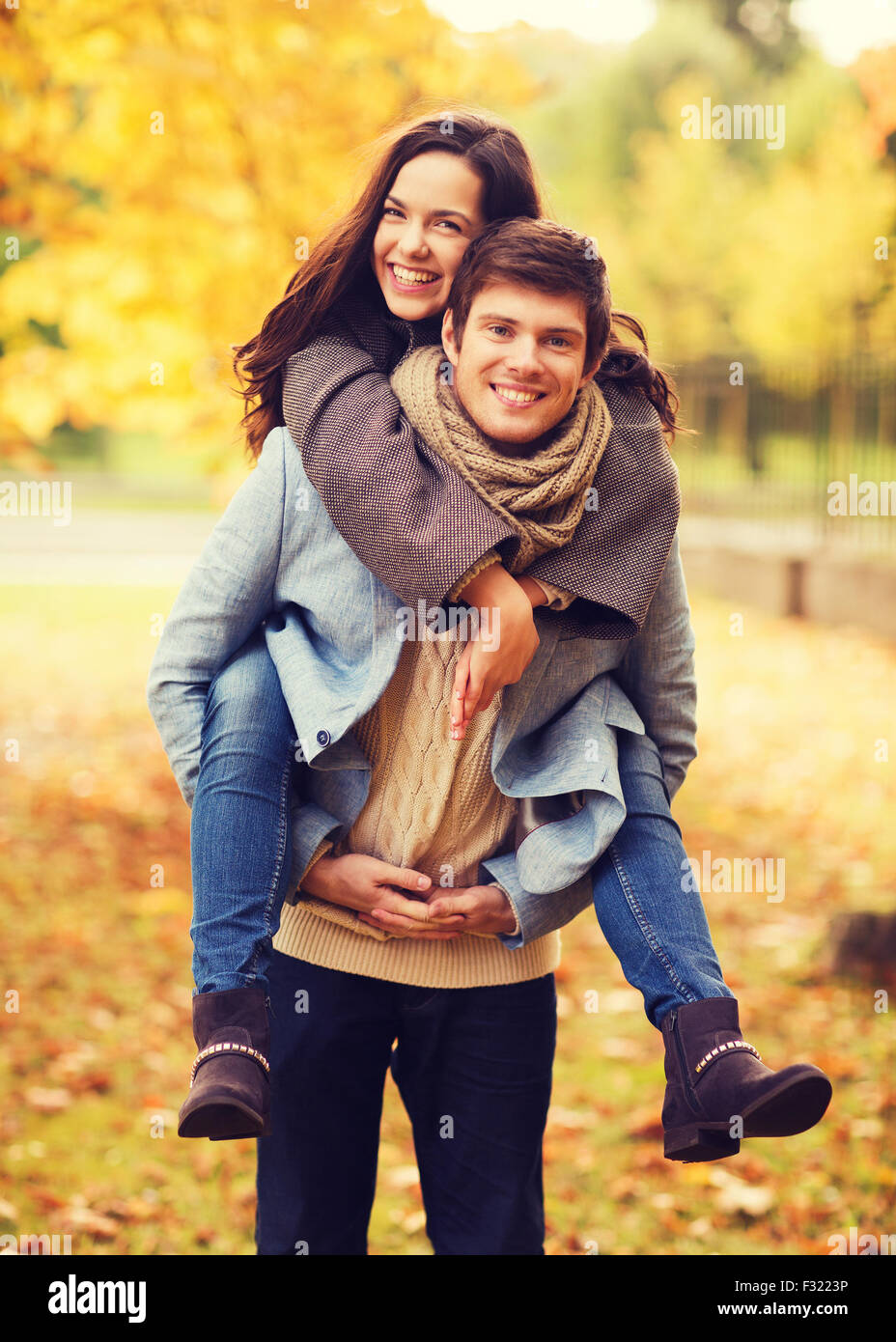 Teenage couple hugging in park hi-res stock photography and images - Alamy