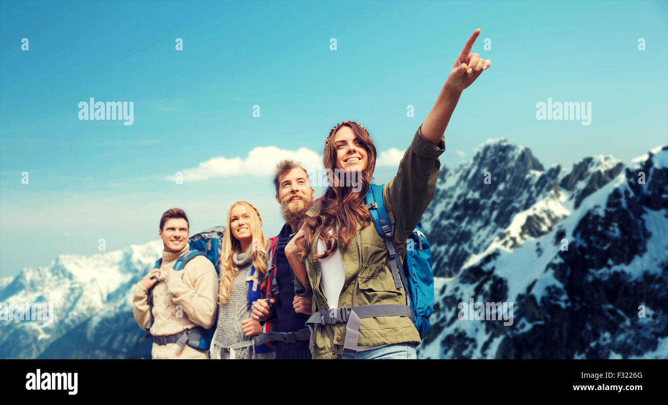 group of smiling friends with backpacks hiking Stock Photo - Alamy