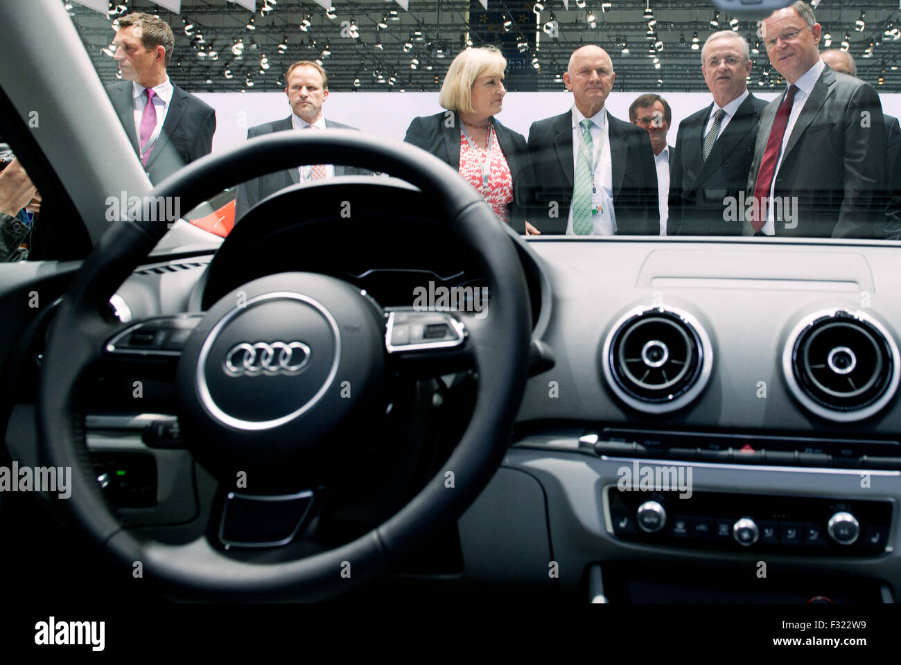 Lower Saxony's premier Stephan Weil (R-L), Volkswagen (VW) chairman of the management board, Martin Winterkorn, Volkswagen chairman of the supervisory board, Ferdinand Piech and his wife and supervisory board member Ursula Piech stand behind an Audi during the VW general meeting in Hanover, Germany, 25 April 2013. Photo: JULIAN STRATENSCHULTE Stock Photo
