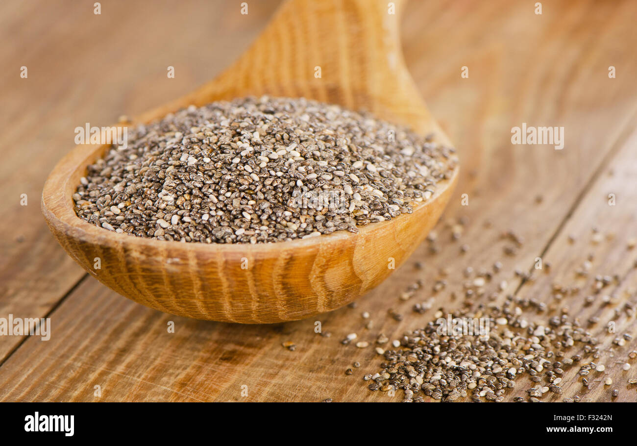 chia seeds on a  wooden table. Selective focus Stock Photo