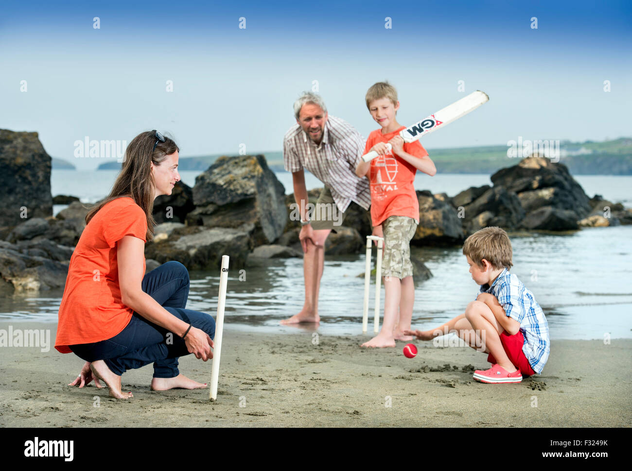 Family playing summer beach hi-res stock photography and images - Alamy