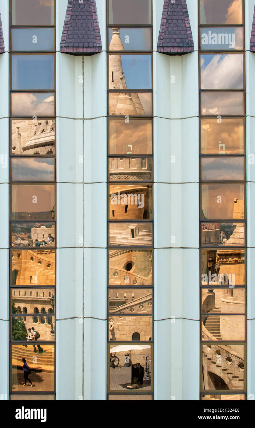 Fishermans Bastion reflected in the windows of the Hilton Hotel, castle hill, Budapest, Hungary Stock Photo