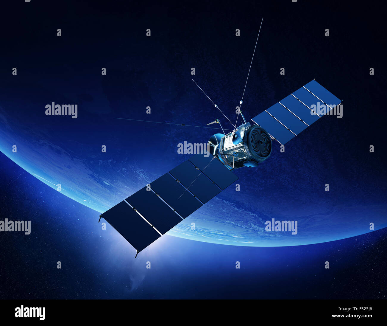 Communications satellite orbiting Earth with sunrise in space (Elements of this 3d render furnished by NASA) Stock Photo