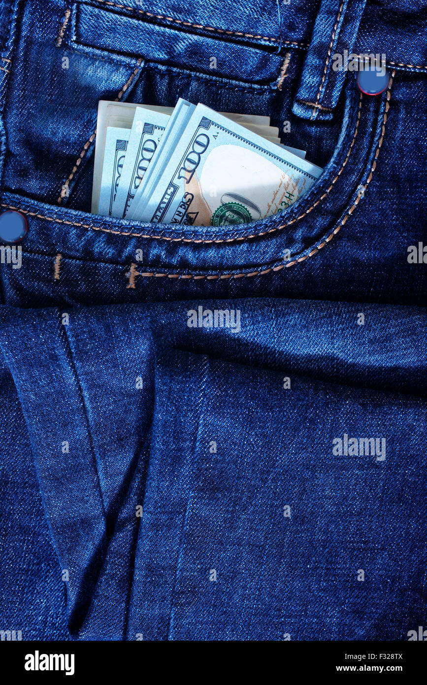 dollars in jeans pocket, jeans background Stock Photo - Alamy