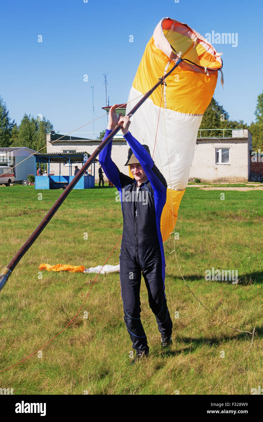 Parachutists 2014. Assembly of a conical textile tube ( windsock) for
