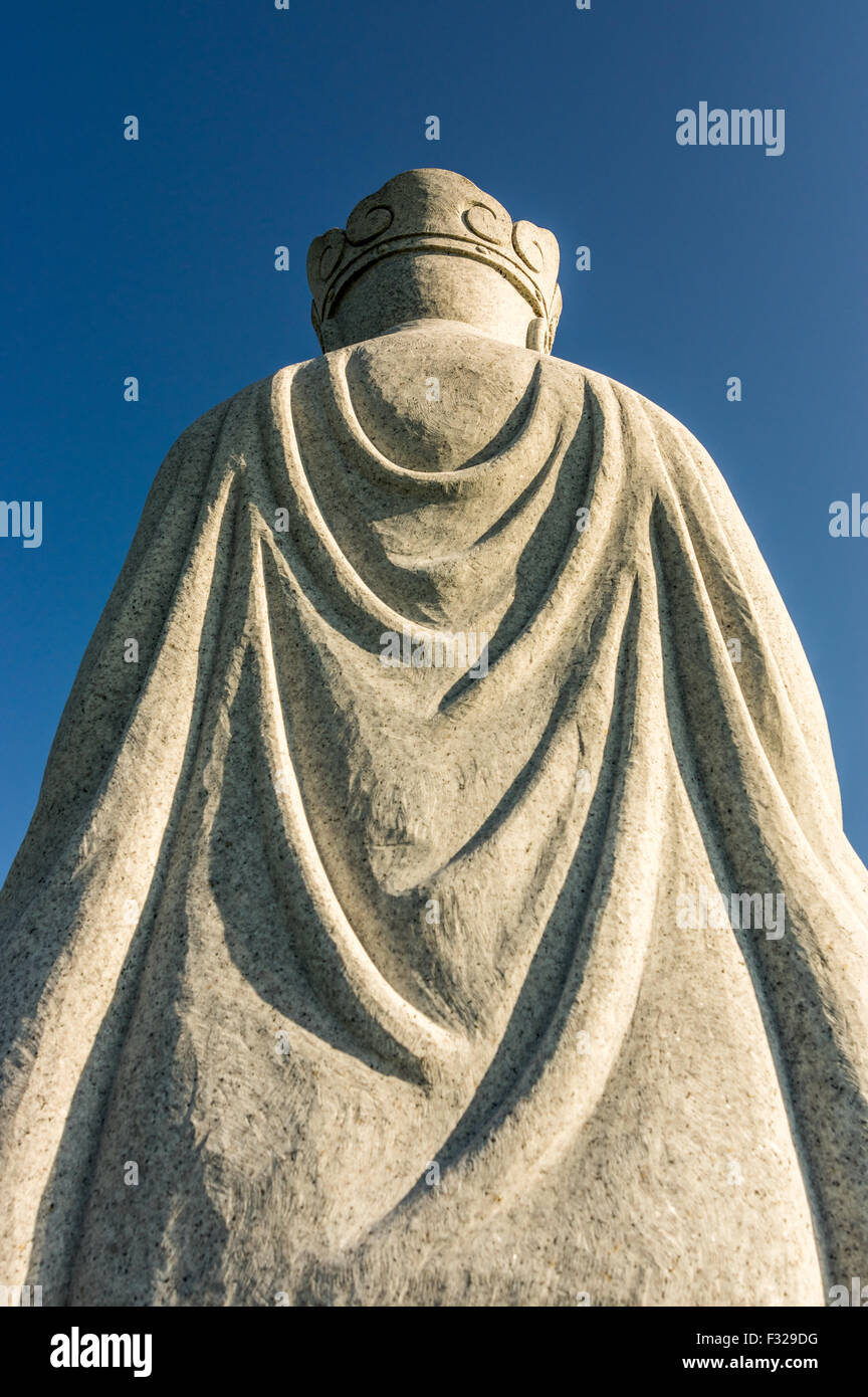 Houston TX USA 9/12/2015:  Standing Buddha at Forest Park Cemetery Stock Photo