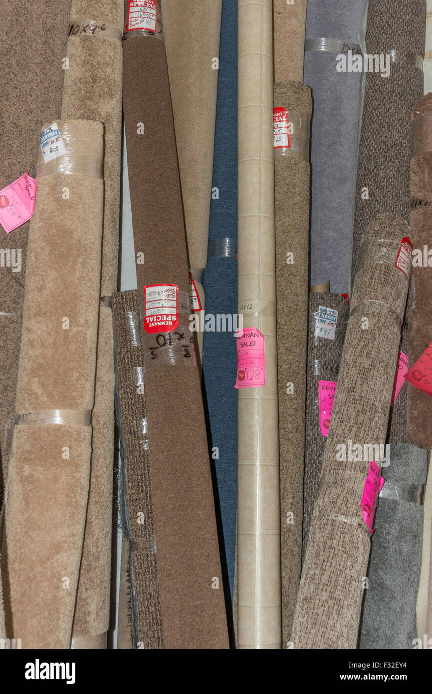 Carpet rolls for sale in an indoor flea market Stock Photo Alamy
