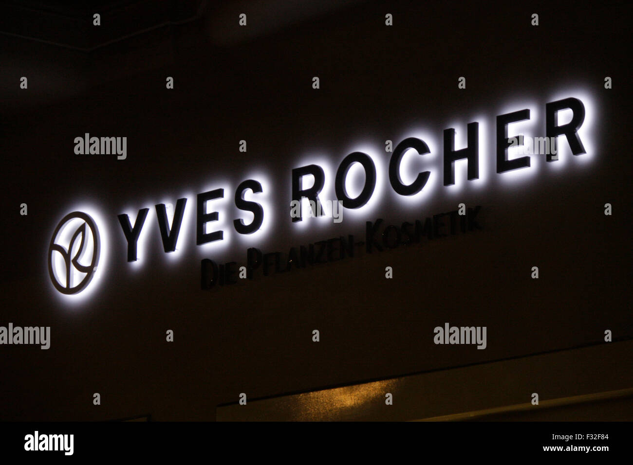 Leuchtreklame fuer 'Yves Rocher', November 2013, Berlin. Stock Photo
