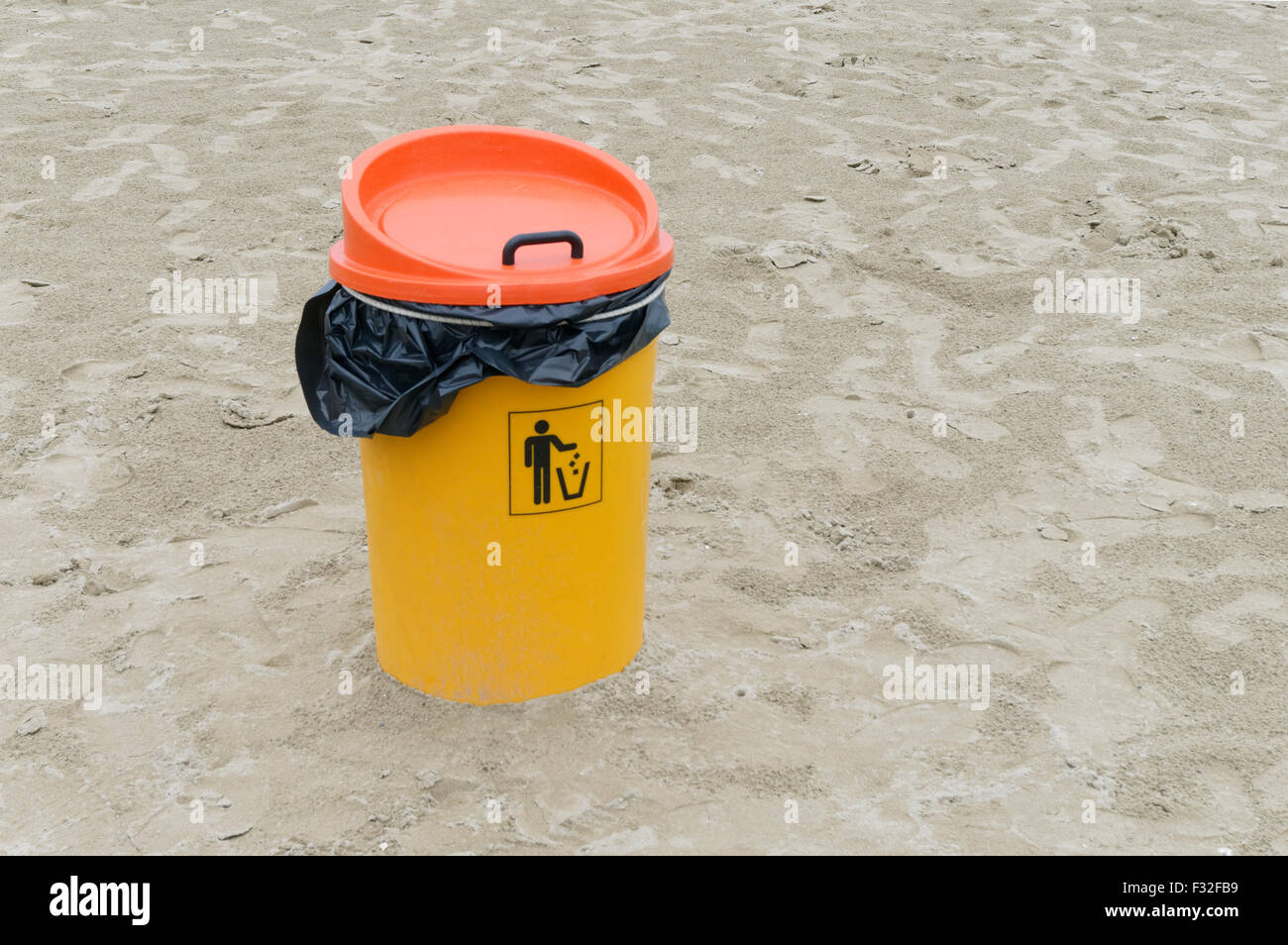 Garbage bin on the beach Stock Photo
