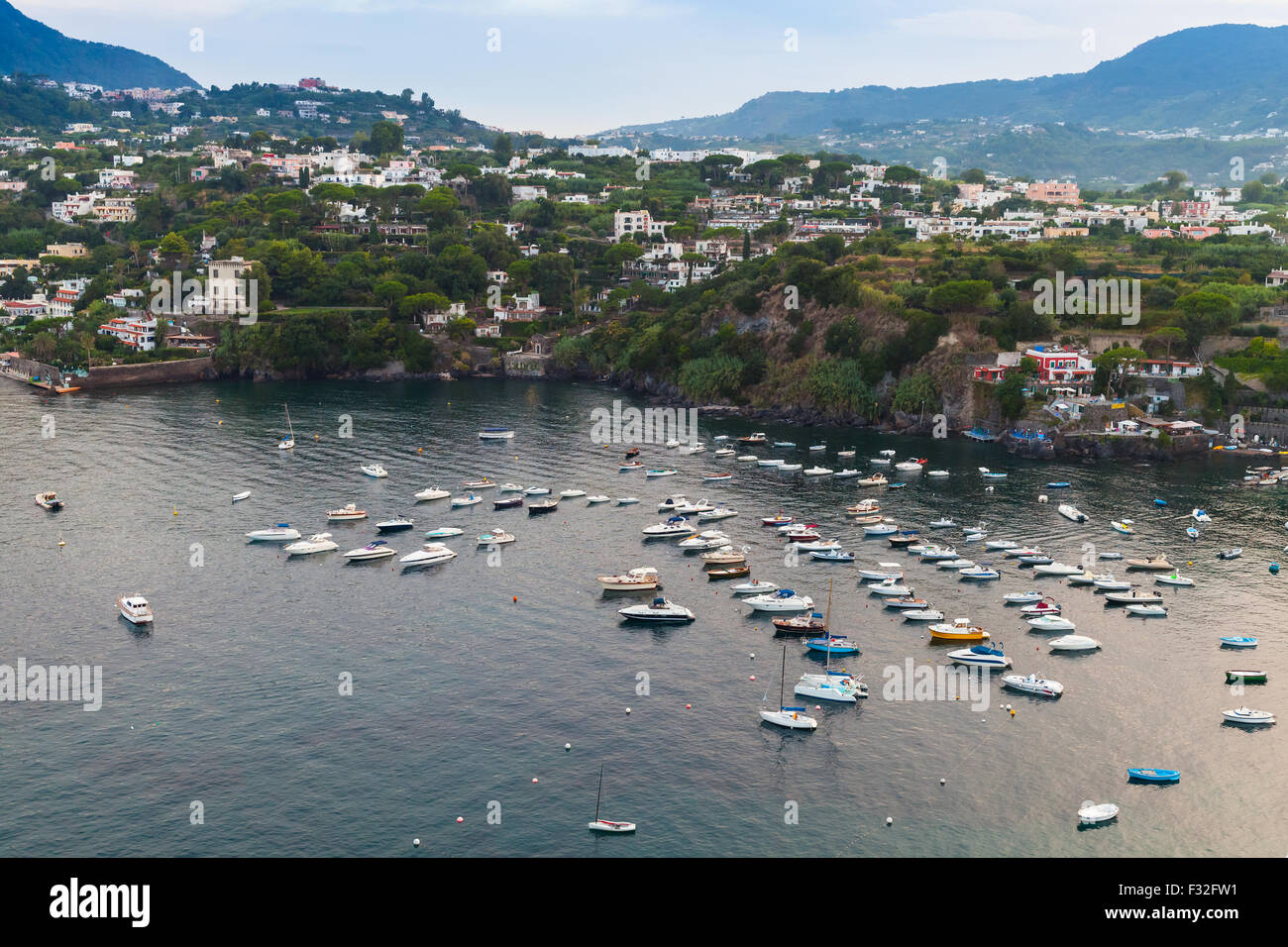 Ischia Porto, coastal landscape with moored boats, Mediterranean Sea, Italy Stock Photo