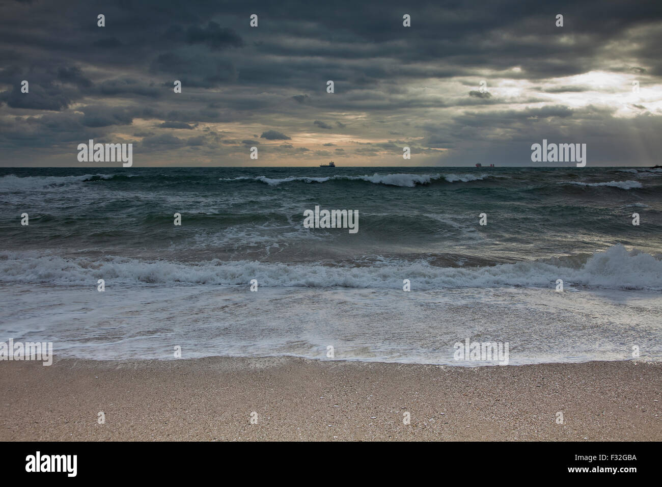 Cargo ships on the horizon Stock Photo - Alamy