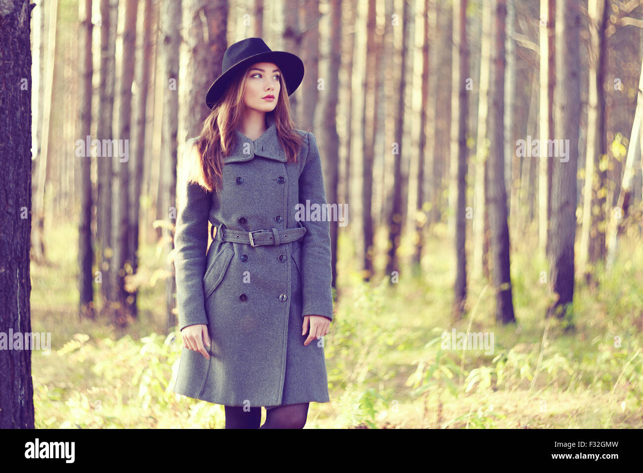 Portrait of young beautiful woman in autumn coat. Fashion photo Stock ...