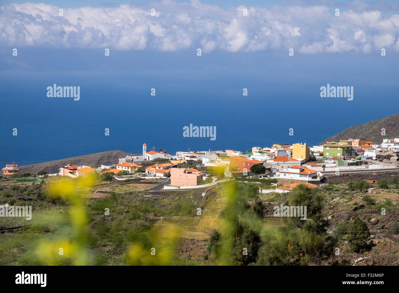View to the sea and La Gomera from above Arguayo, one of Tenerifes many small mountain villages, in the municipality of Santiago Stock Photo