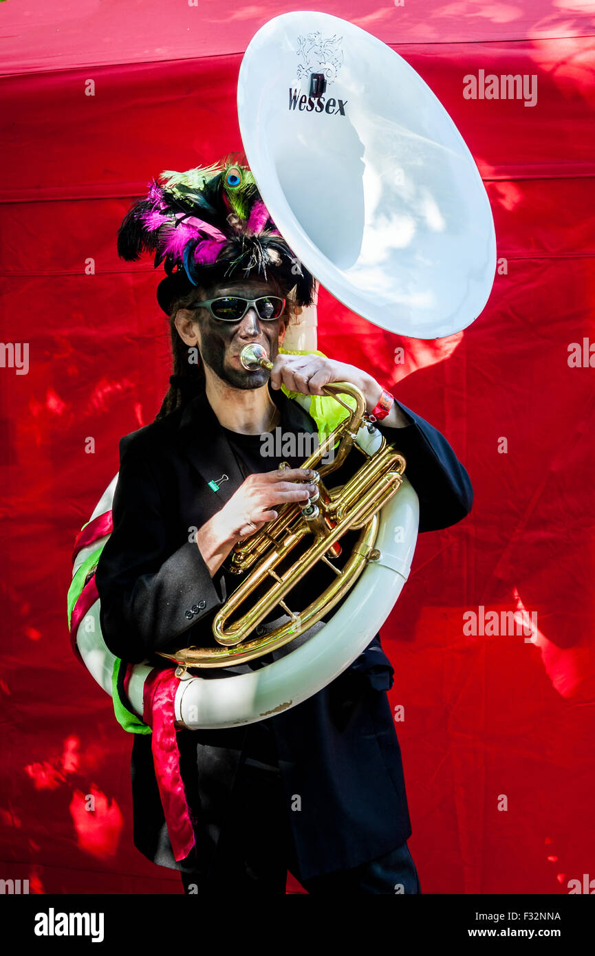 Beorma Border Morris dancer in costume with his sousaphone Stock Photo