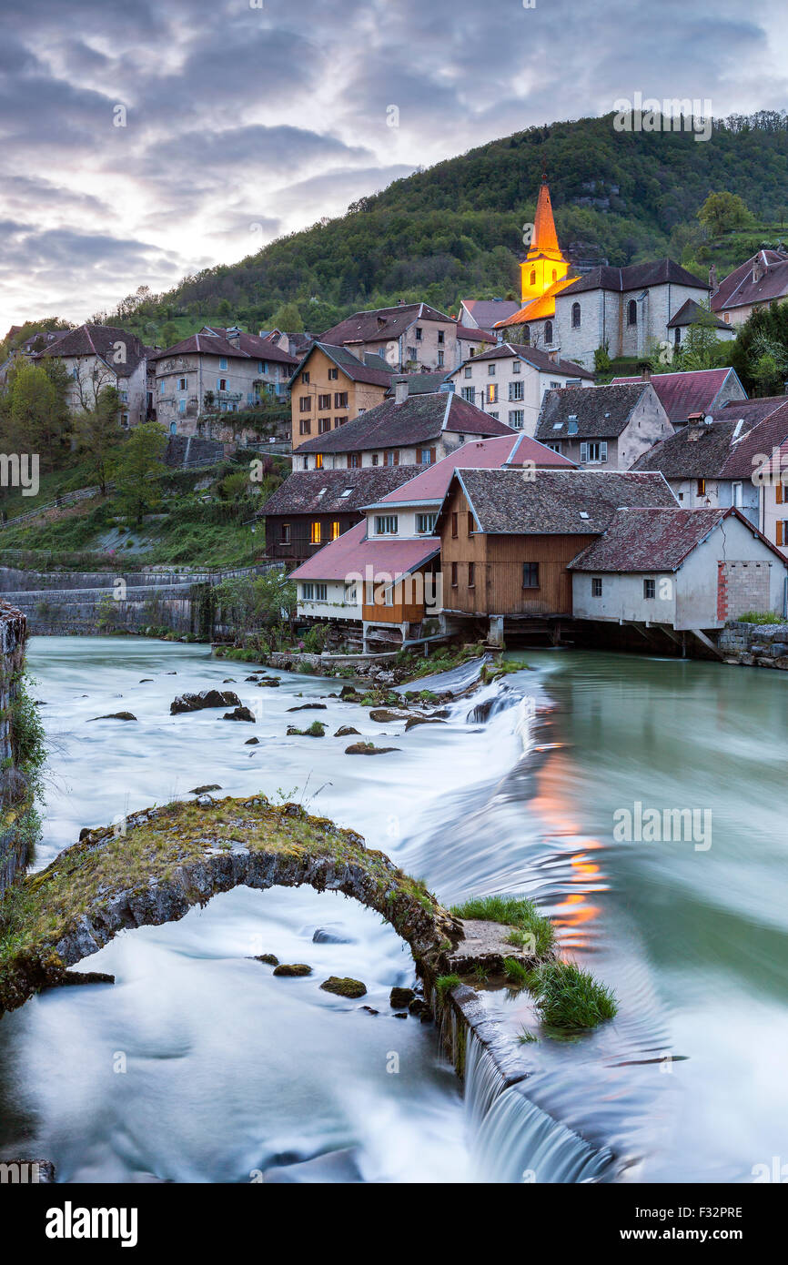 The weir and remains of a medieval bridge on the River Loue, Lods, Franche-Comté, France, Europe. Stock Photo