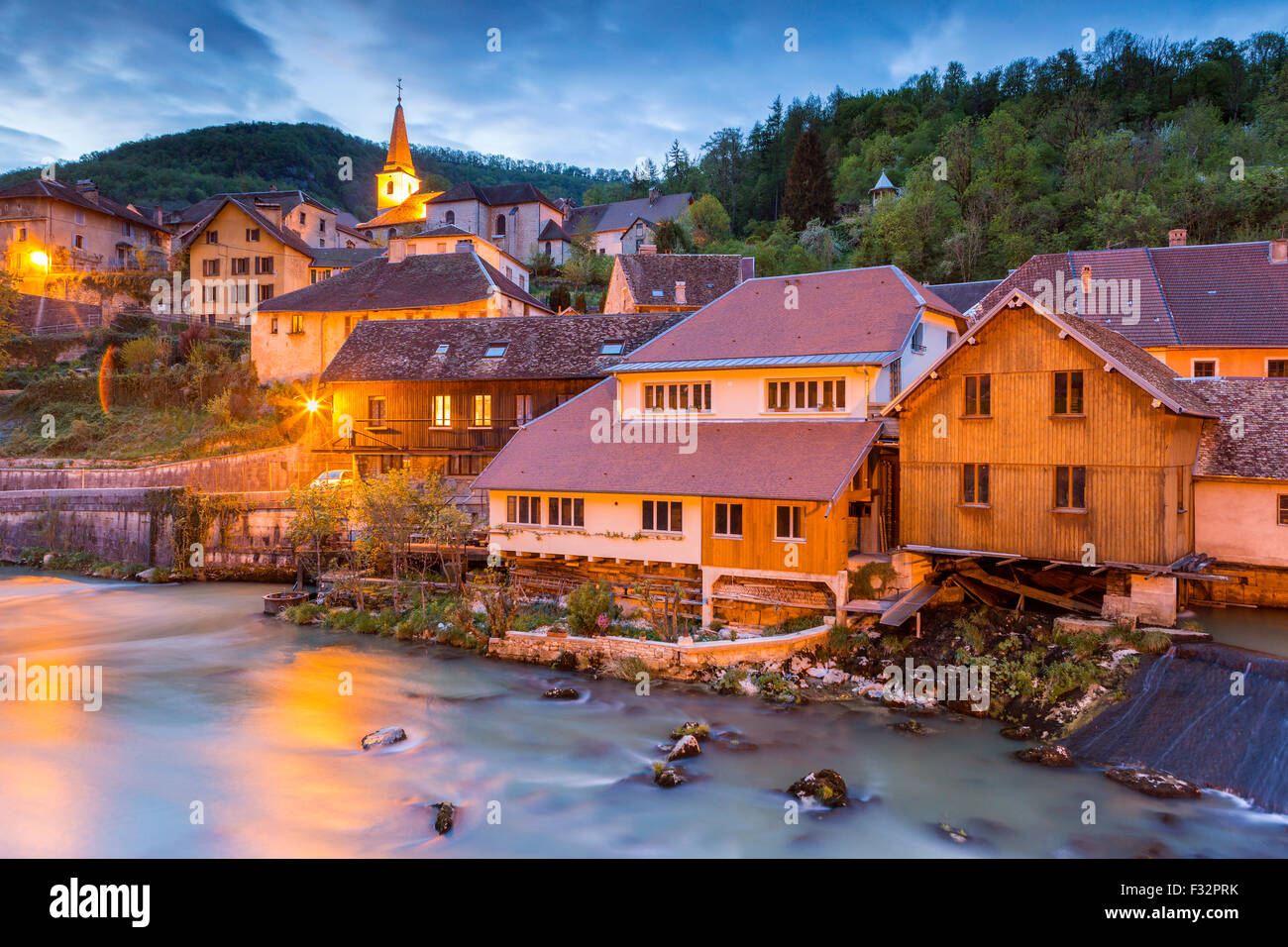 River Loue flowing through picturesque village Lods, Loue Valley, Doubs, Franche-Comte, France, Europe. Stock Photo