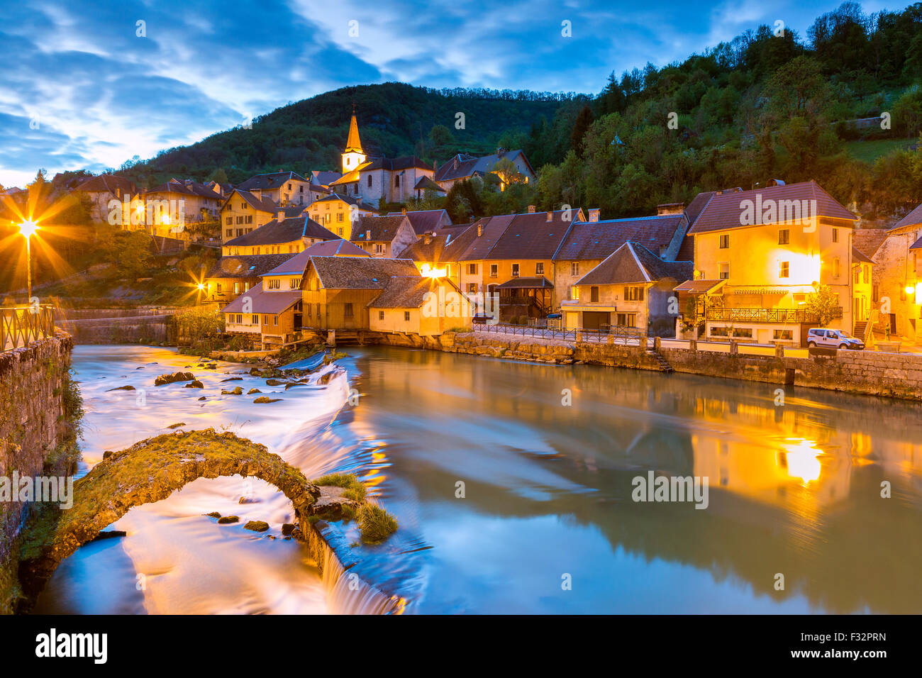 The weir and remains of a medieval bridge on the River Loue, Lods, Franche-Comté, France, Europe. Stock Photo