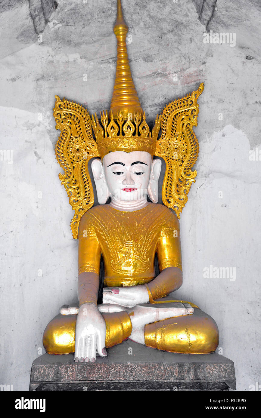 Small gold buddha at the Hpo Win Daung cave complex also known as Pho Win Taung caves, Upper Burma, Myanmar Stock Photo