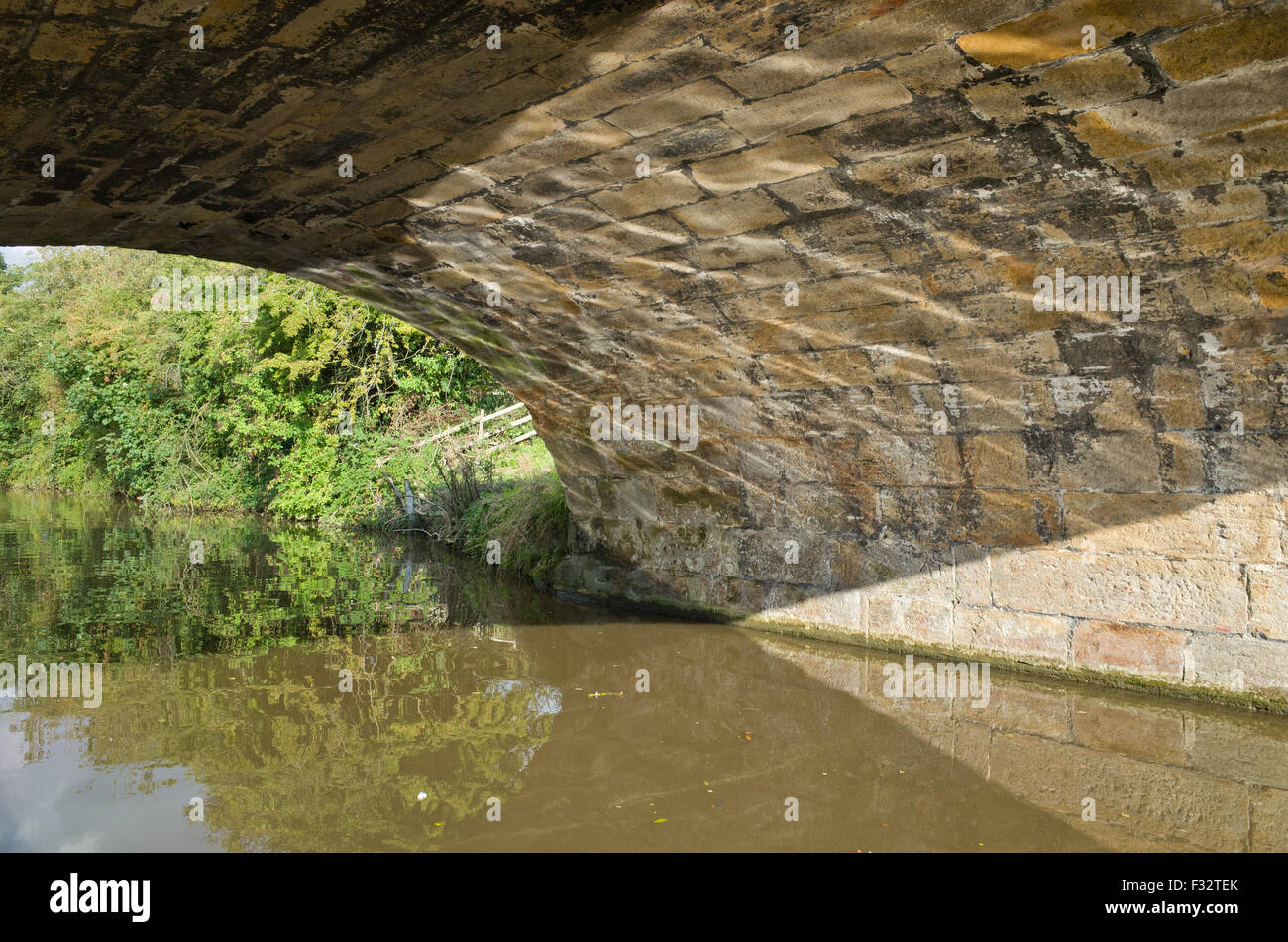 Reflections on underside of bridge Stock Photo