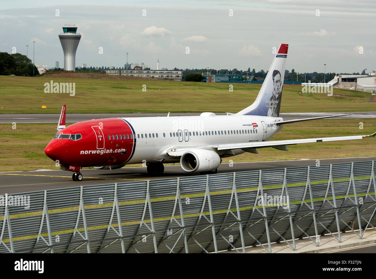 Norwegian Air Shuttle Boeing 737-800 (LN-DYQ) taxiing for take off at Birmingham Airport, UK Stock Photo