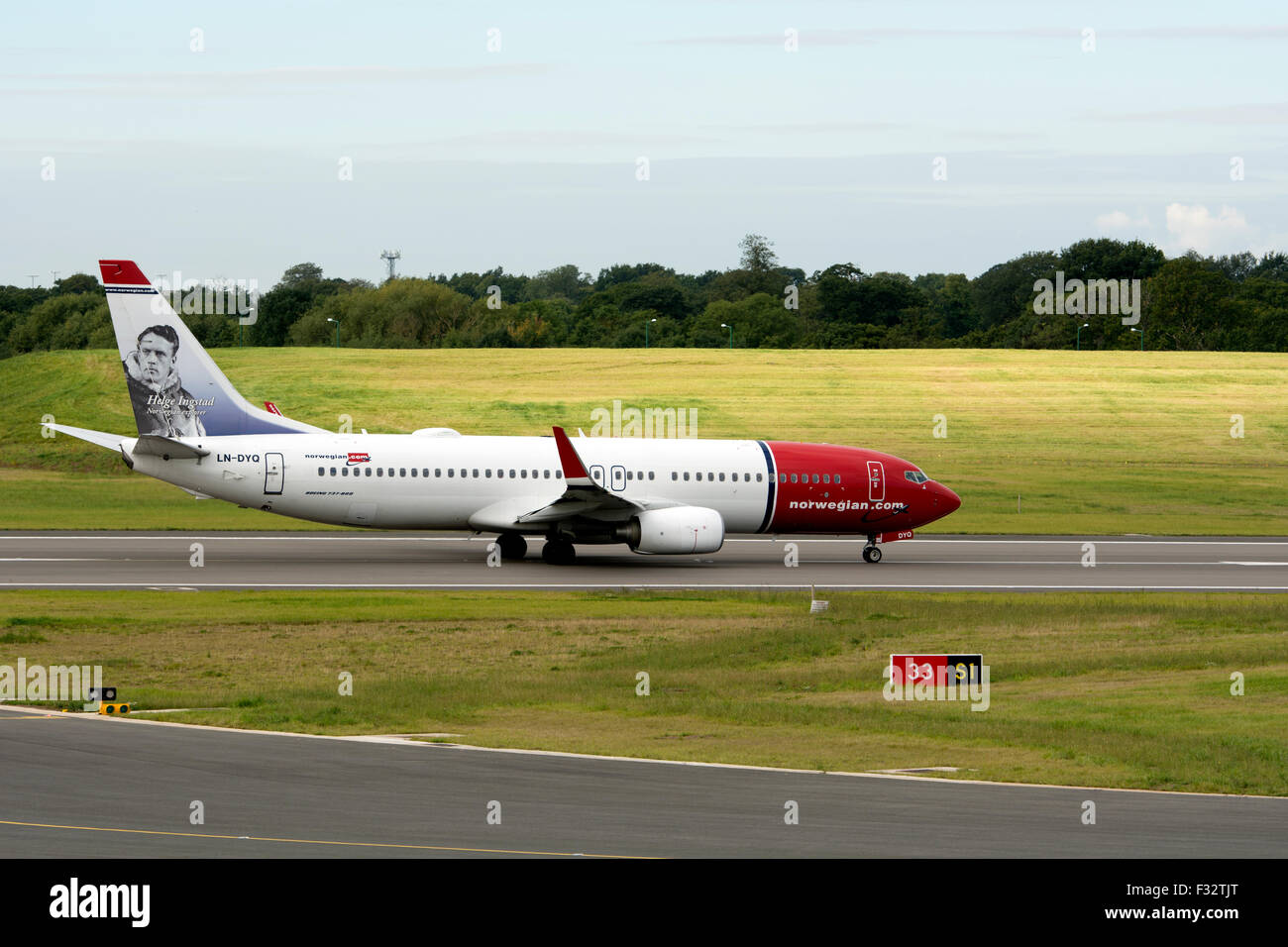 Norwegian Air Shuttle Boeing 737-800 (LN-DYQ) ready for take off at Birmingham Airport, UK Stock Photo