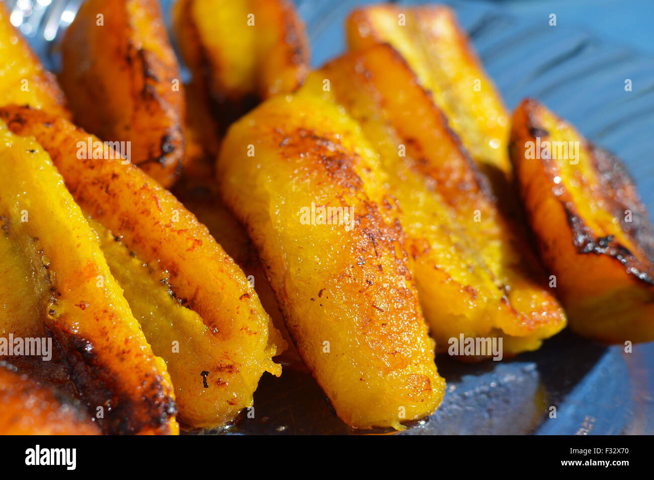 Ripe fried plantain - traditional food served for breakfast or separately with sour cream in Guatemala and Central America Stock Photo
