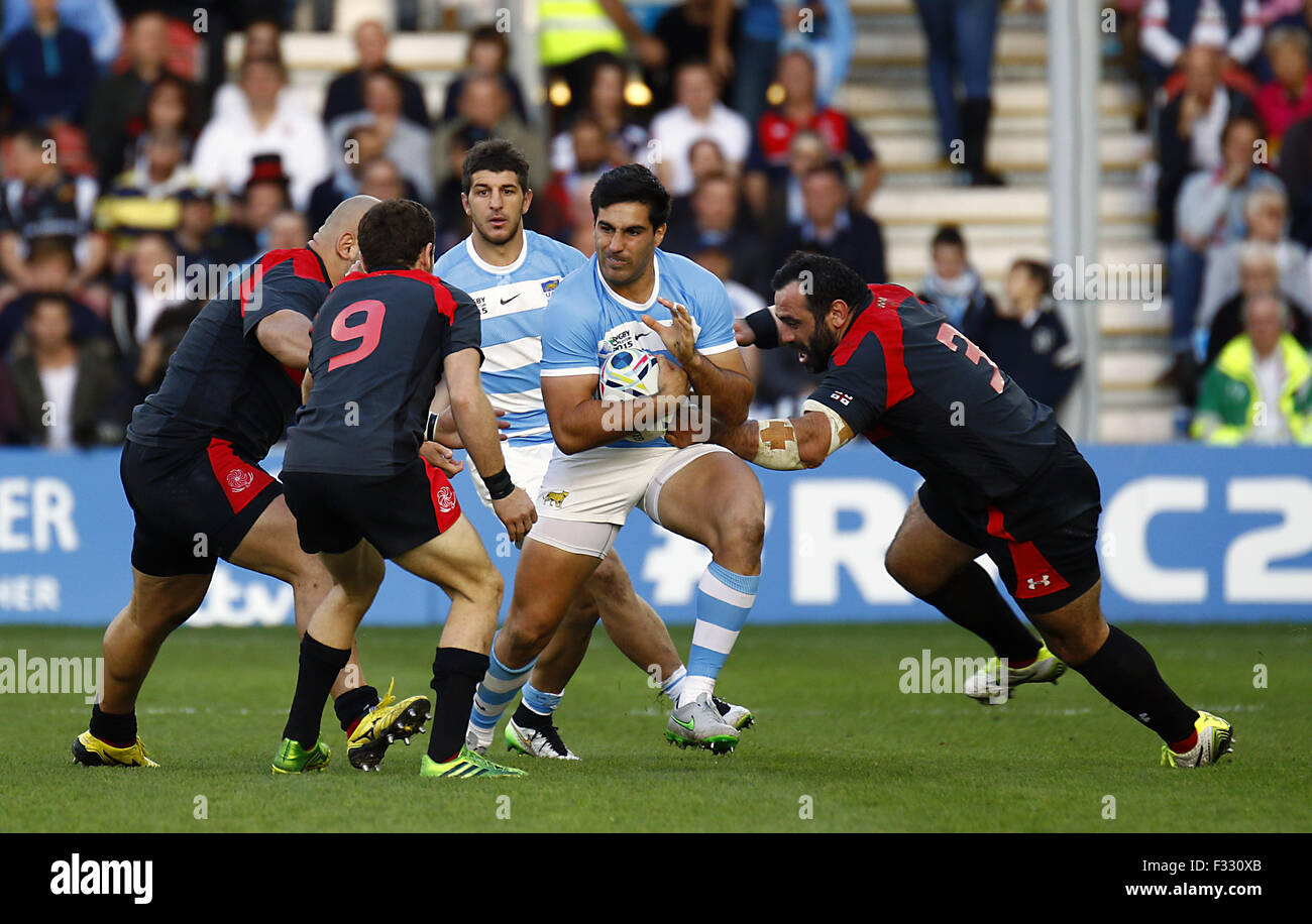 Gloucester, UK. 25th Sep, 2015. GLOUCESTER - SEPTEMBER 25: Argentina's Jeronimo de la Fuente under pressure from Georgia's Vasil Lobzhanidze during the 2015 Rugby World cup match-up between Argentina and Georgia being held at Kingsholm in Gloucester. Argentina defeated Georgia 54-9.Photo Credit: Andrew Patron/Zuma Newswire © Andrew Patron/ZUMA Wire/Alamy Live News Stock Photo