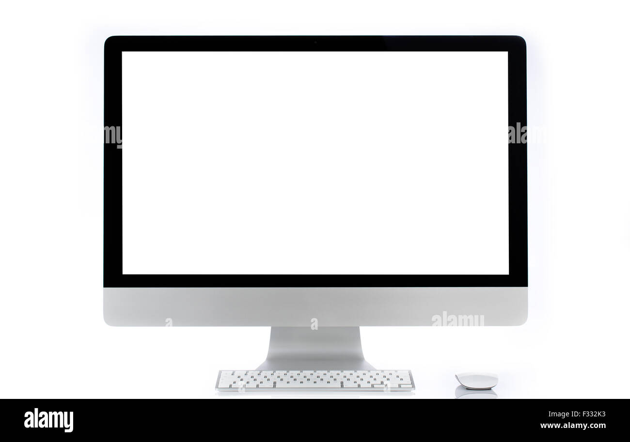 Desktop computer with wireless keyboard and mouse. Stock Photo