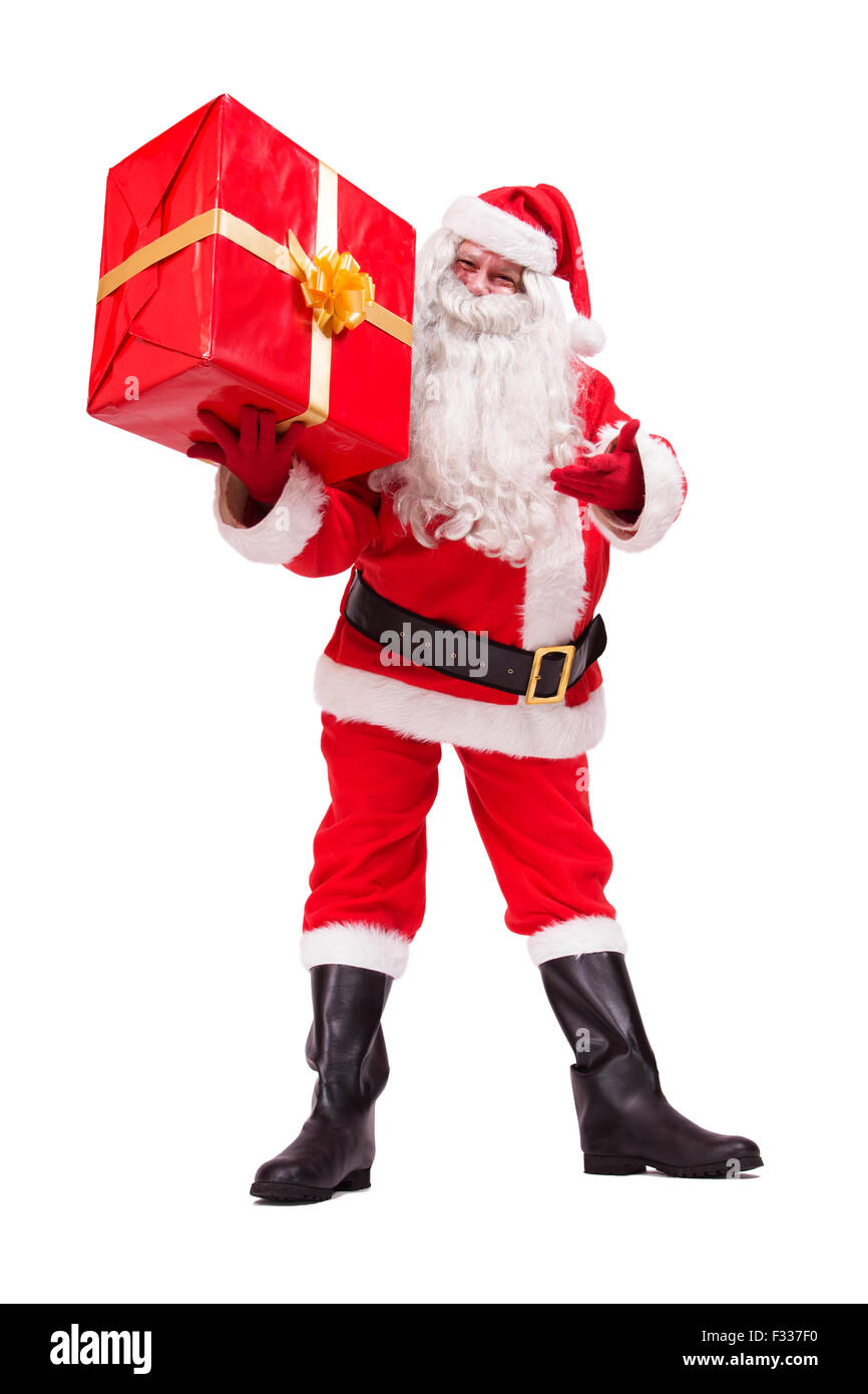 Santa Claus shows gift isolated on white background Stock Photo - Alamy