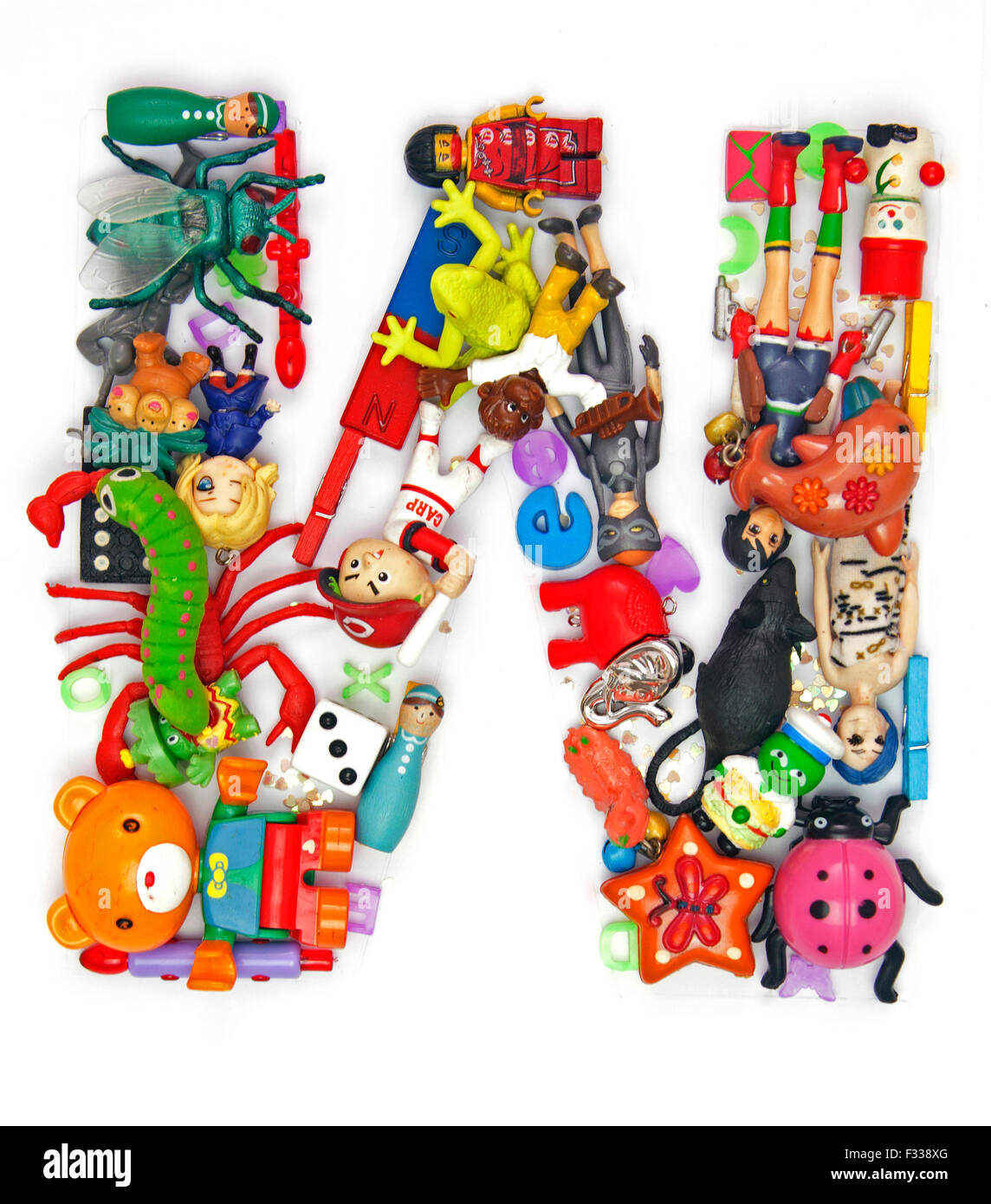 the letter W made from small toys Stock Photo Alamy