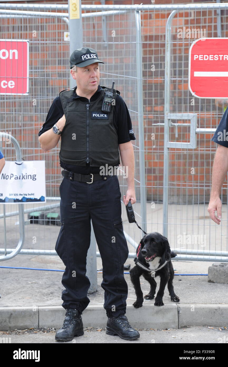 A Greater Manchester Police Dog Handler with his search dog Stock Photo