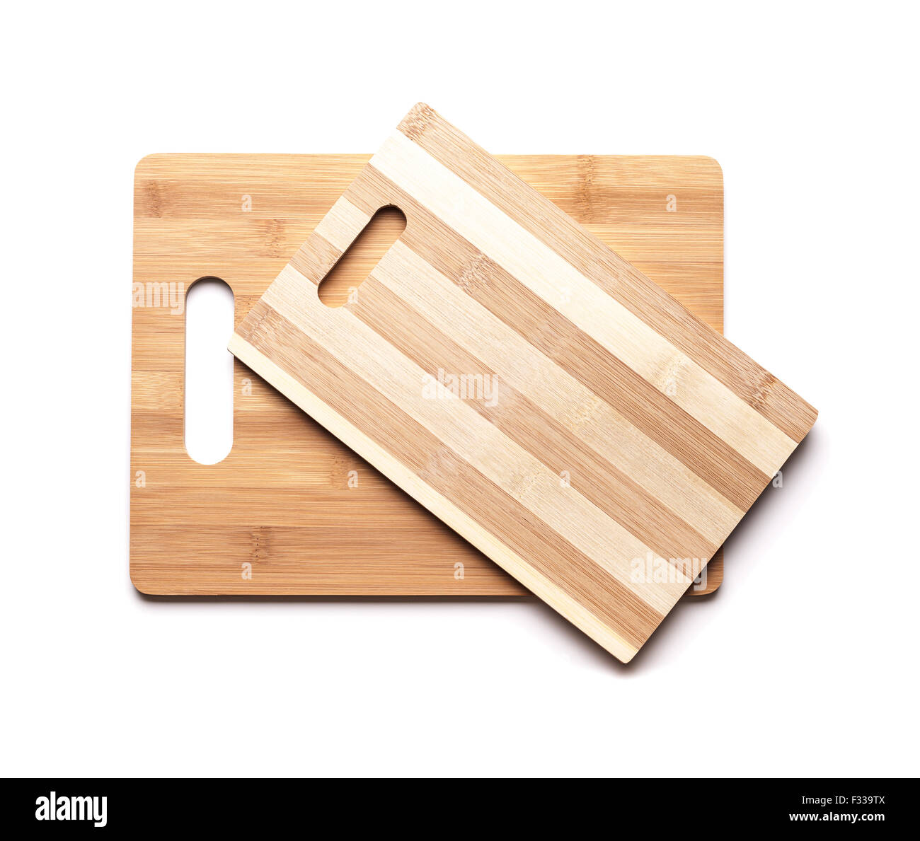 https://c8.alamy.com/comp/F339TX/new-cutting-boards-made-of-bamboo-planks-on-white-table-background-F339TX.jpg