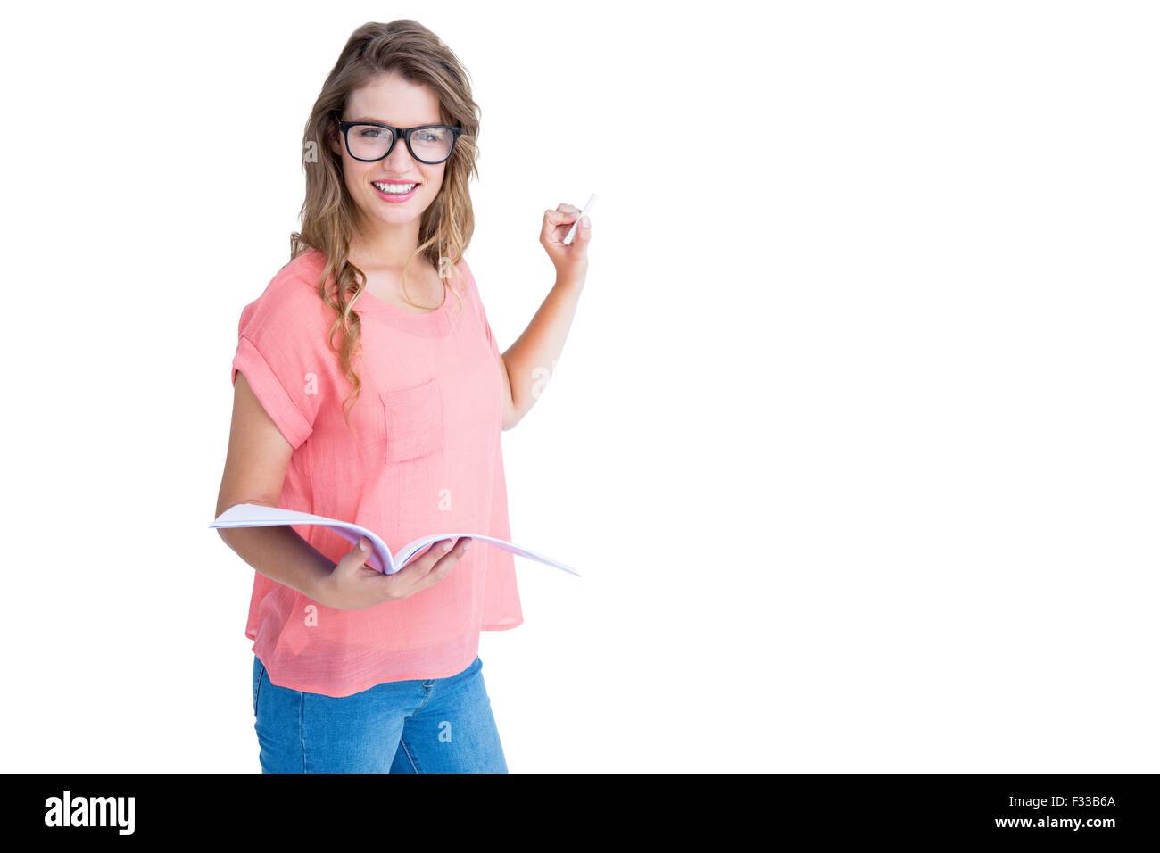 Composite image of hipster woman holding notebook Stock Photo