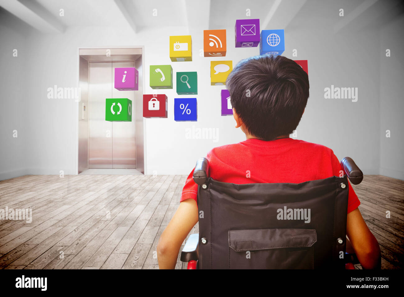 Composite image of rear view of boy sitting in wheelchair Stock Photo