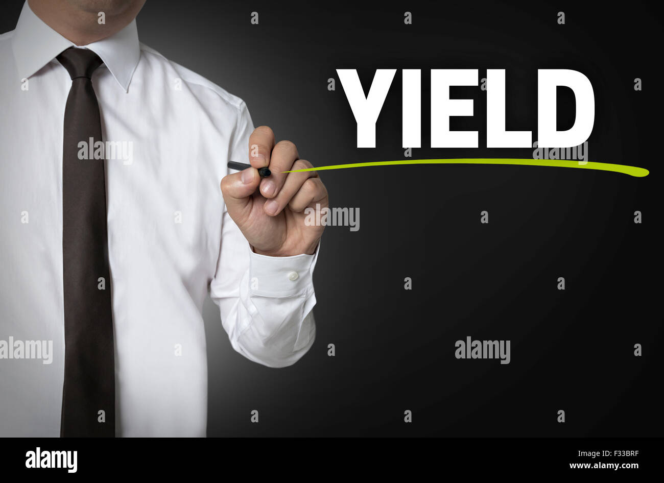 yield written by businessman background concept. Stock Photo
