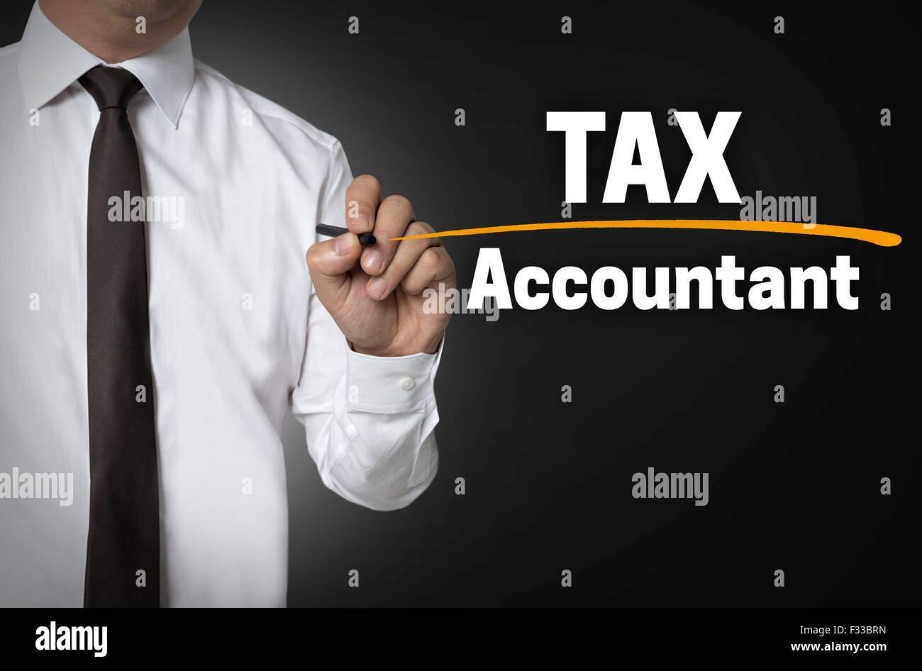 Tax accountant is written by businessman background concept. Stock Photo