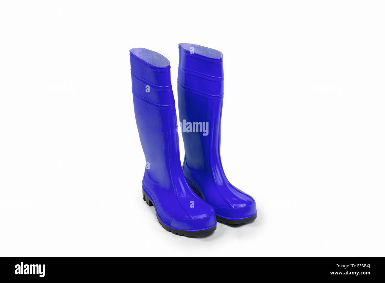 Rubber boots and umbreall isolated Stock Photo