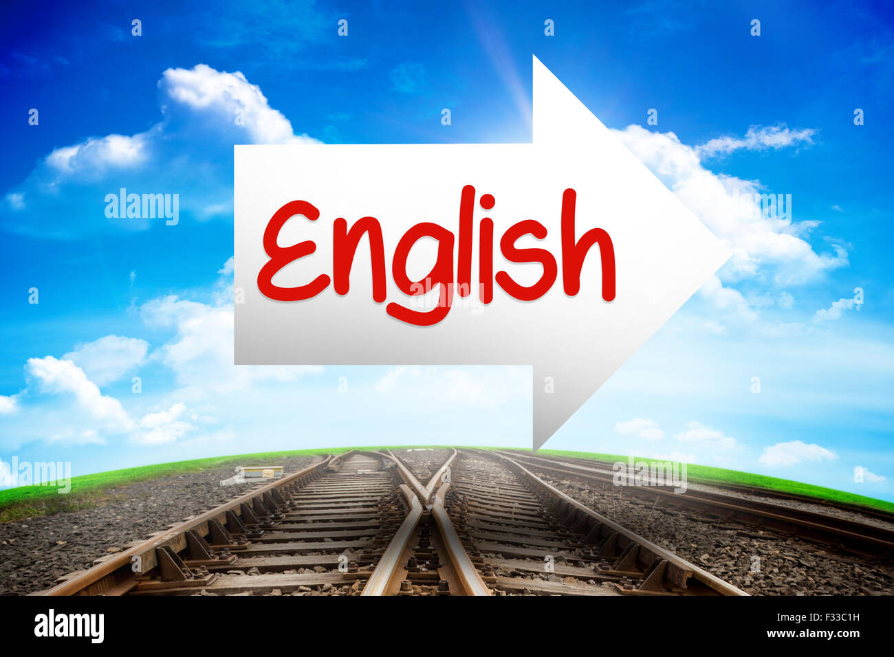 English against railway leading to blue sky Stock Photo