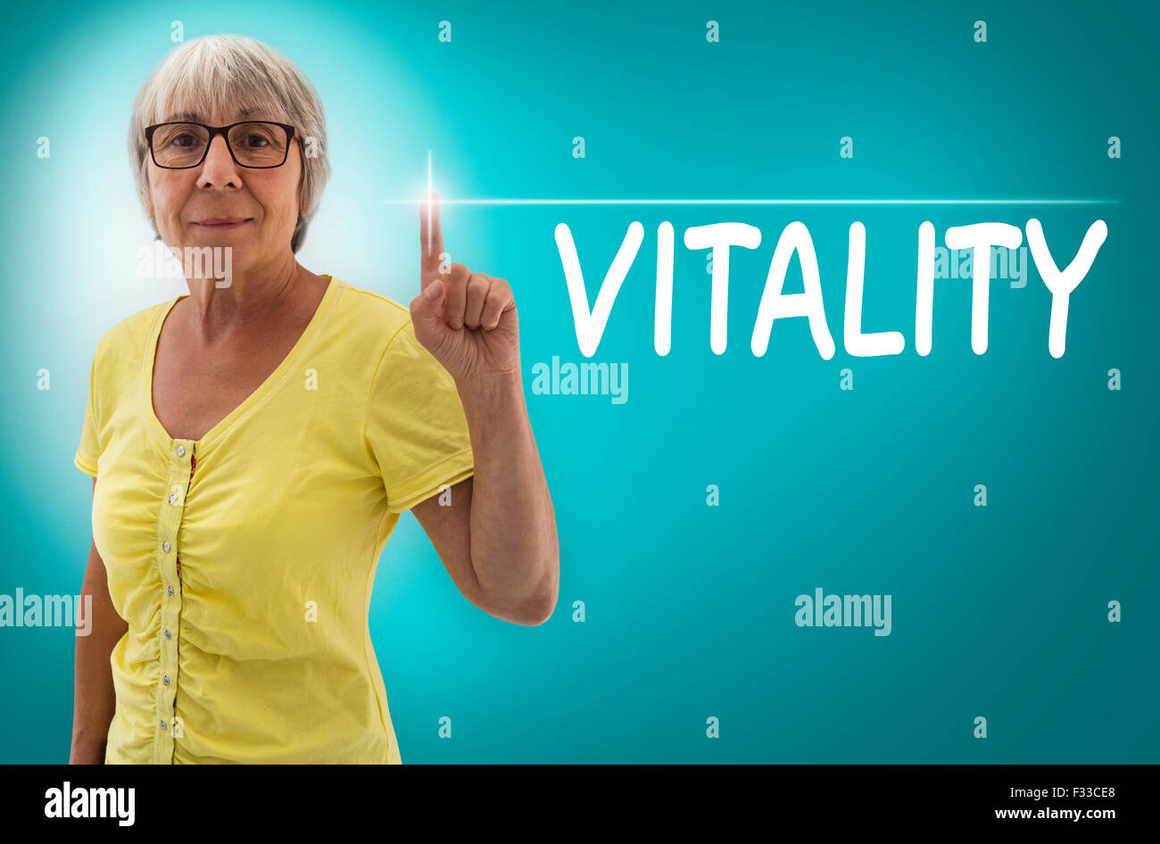 Vitality touchscreen is shown by Senior woman concept. Stock Photo