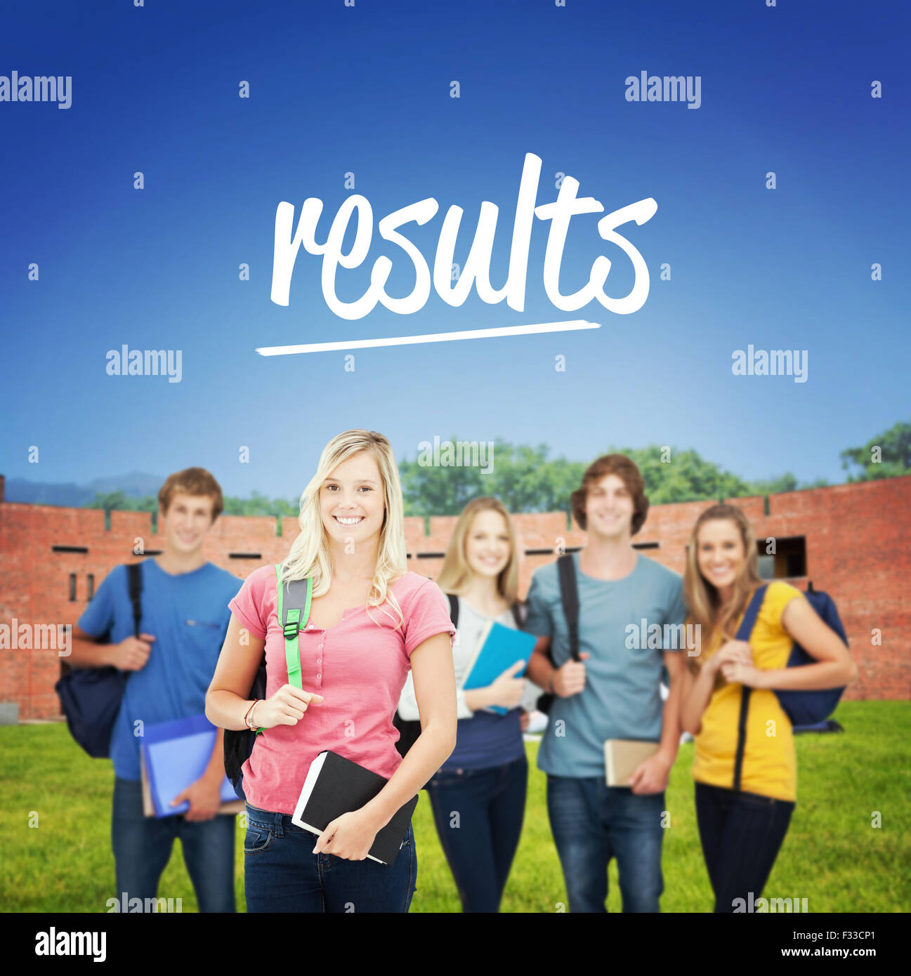 Results against students using laptop in lawn against college building Stock Photo