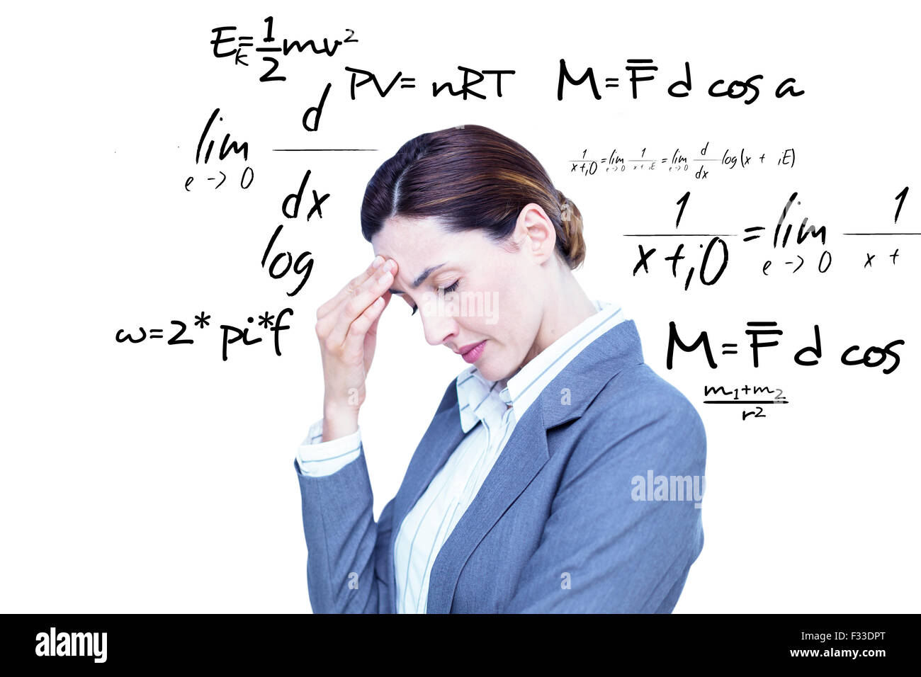 Composite image of concentrating businesswoman Stock Photo