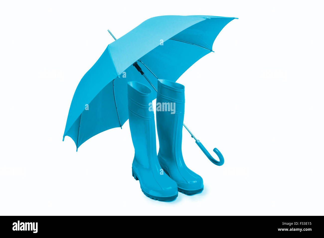 Blue rubber boots and umbrella isolated Stock Photo