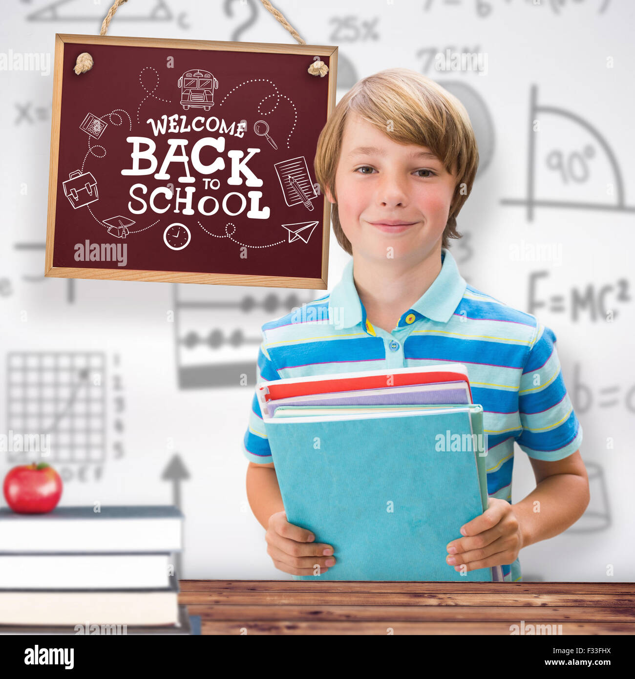 Composite image of cute pupil smiling at camera in library Stock Photo ...