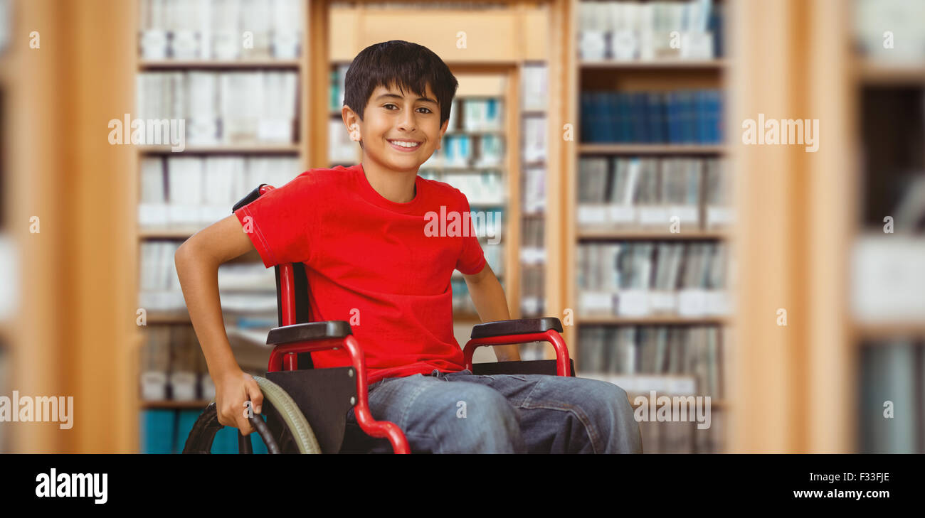 Composite image of portrait of boy sitting in wheelchair Stock Photo