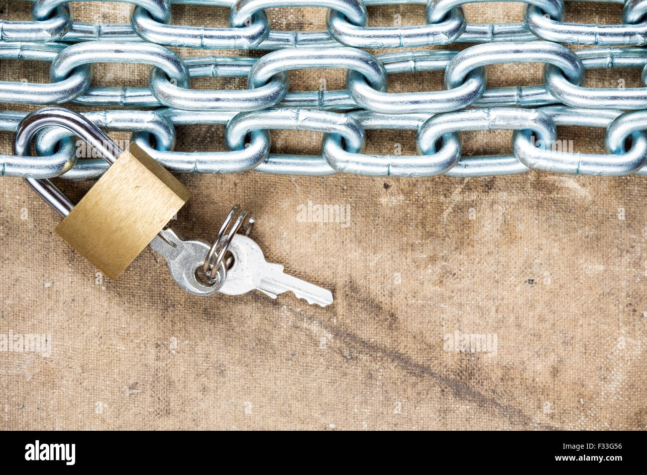Chains and lock on the dirty grunge background Stock Photo Alamy