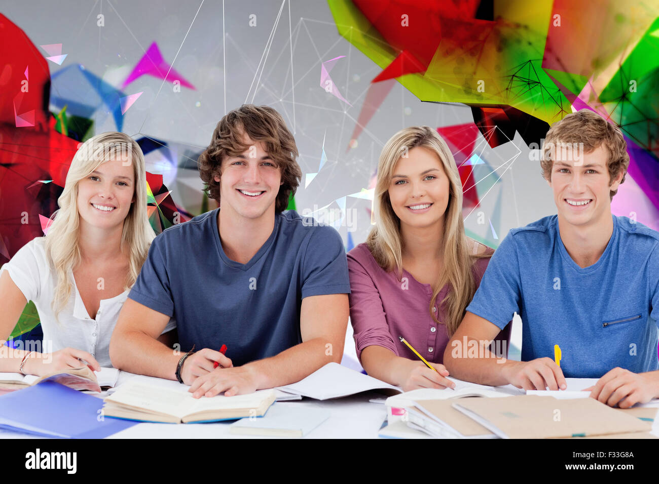 Composite image of four students looking at the camera Stock Photo - Alamy